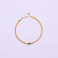 Gold Link Chain Bracelet with Baguette Cut Emerald Stone Charm