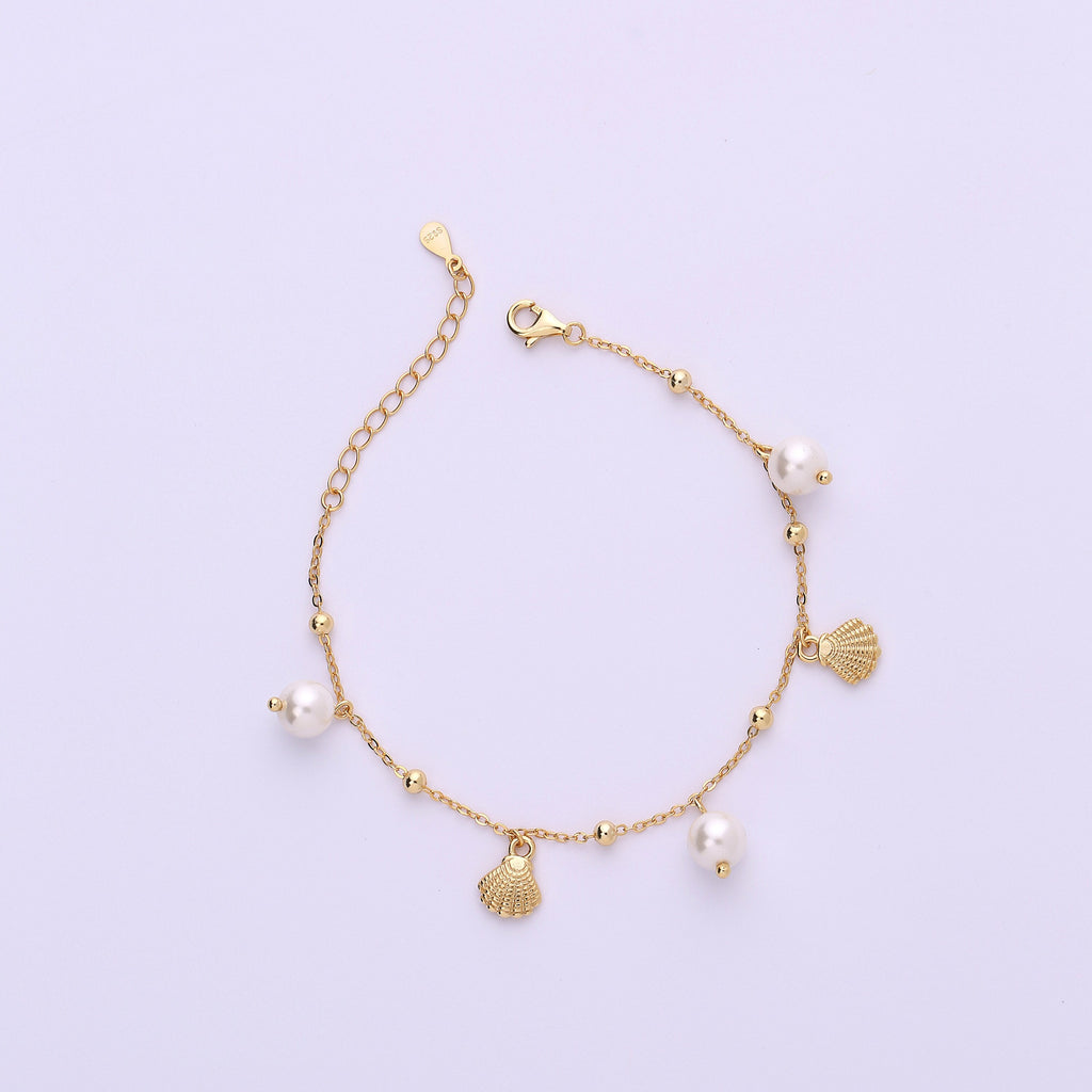 Dangling Pearl and Seashell Charm Bracelet in Sterling Silver