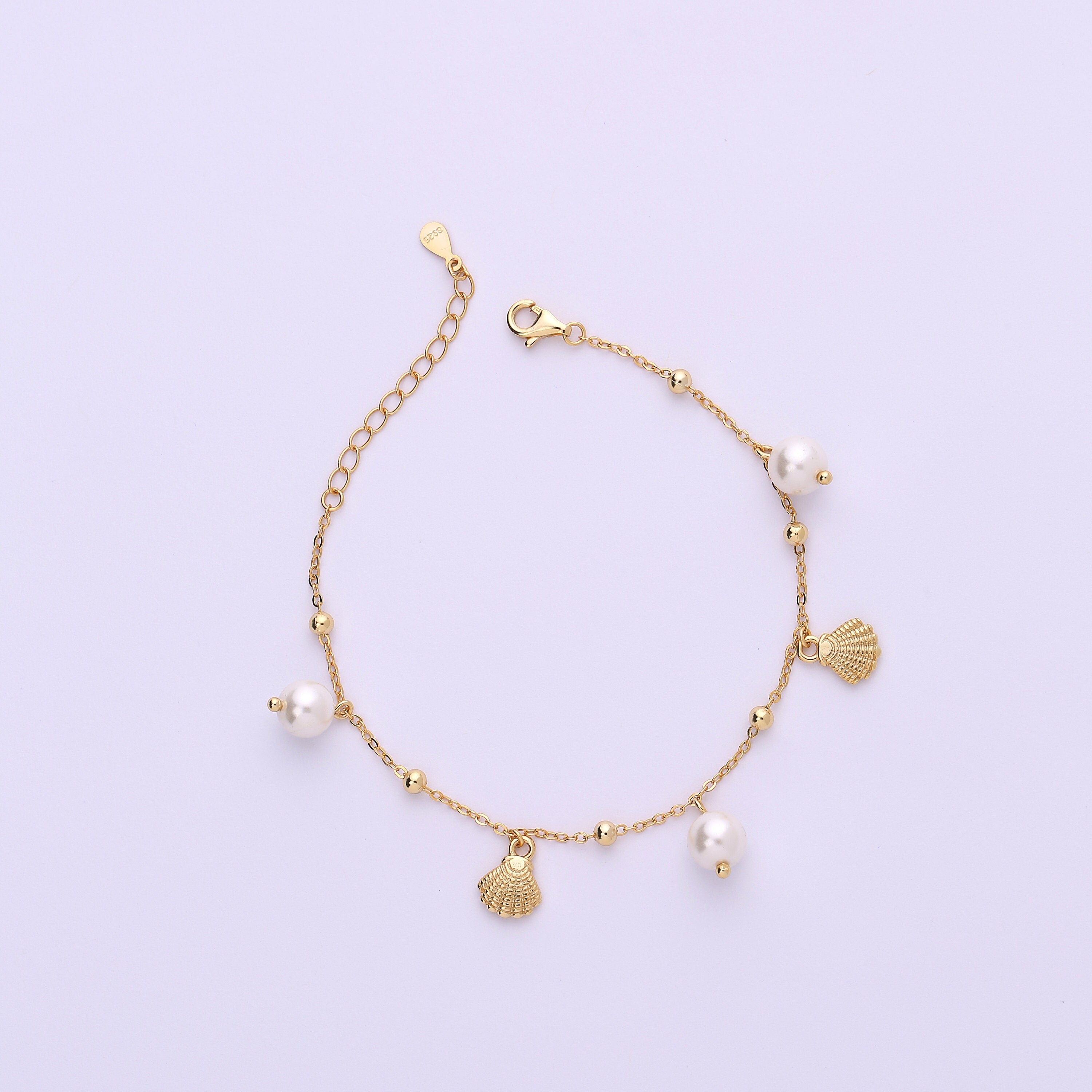 Dangling Pearl and Seashell Charm Bracelet in Sterling Silver
