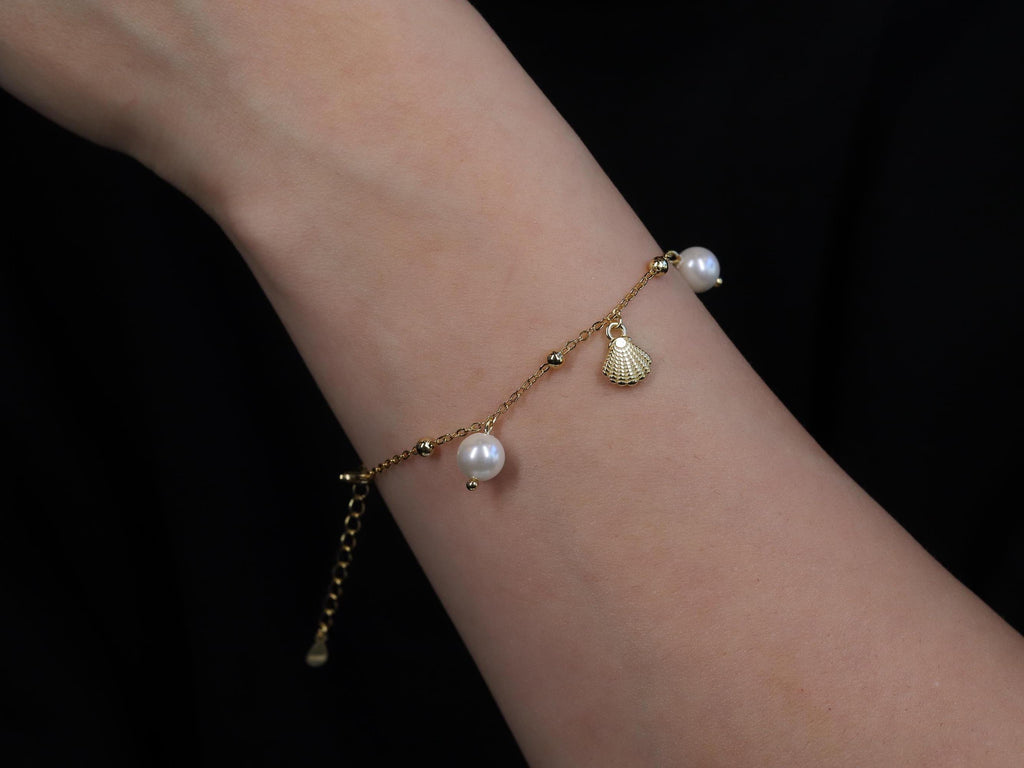 Dangling Pearl and Seashell Charm Bracelet in Sterling Silver