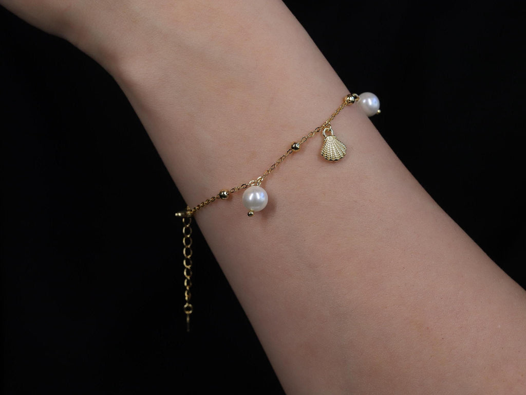 Dangling Pearl and Seashell Charm Bracelet in Sterling Silver