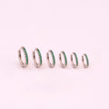Tiny Emerald CZ Huggie Hoop Earrings